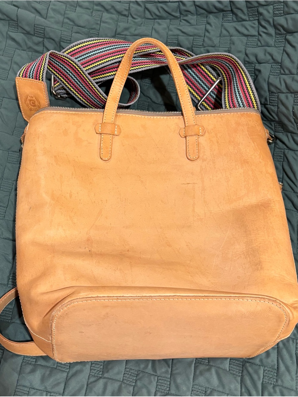 Consuela Diego Sling Tan Leather Backpack with Multicolor Striped Strap